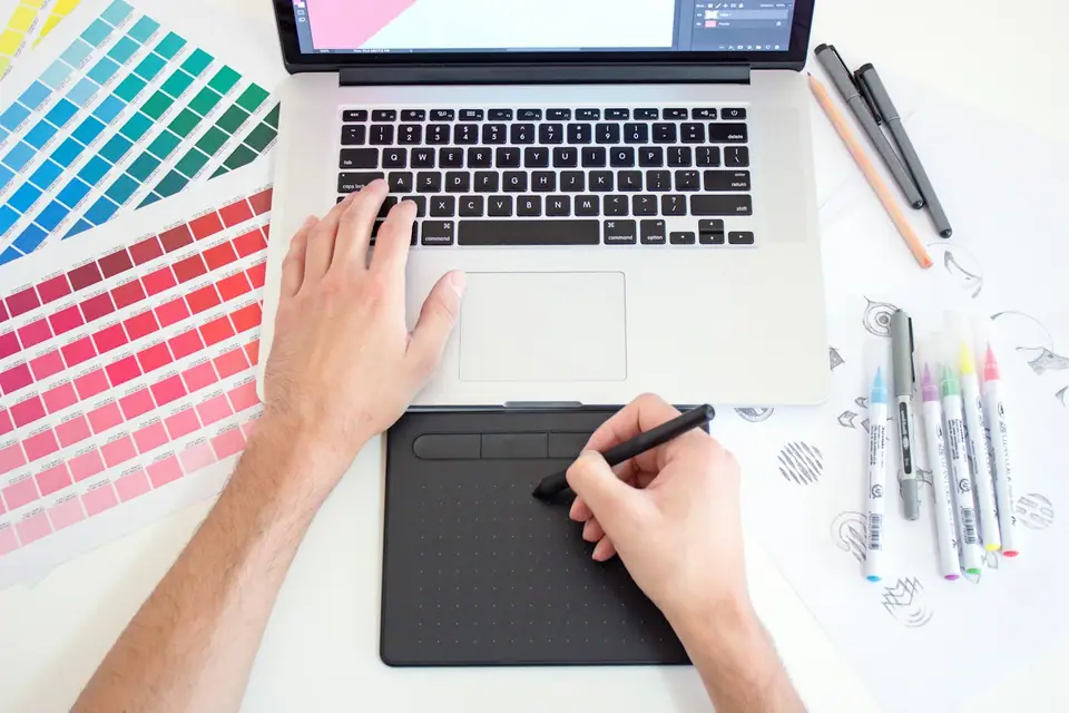 Colour swatches beside a tablet