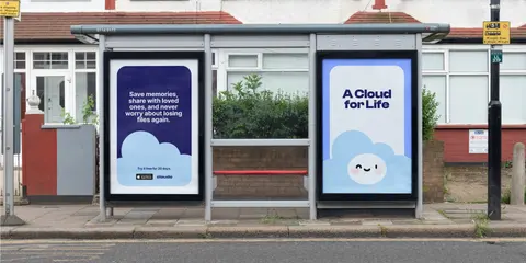 A bus shelter with two Cloudo adverts showing a smiling cloud mascot.