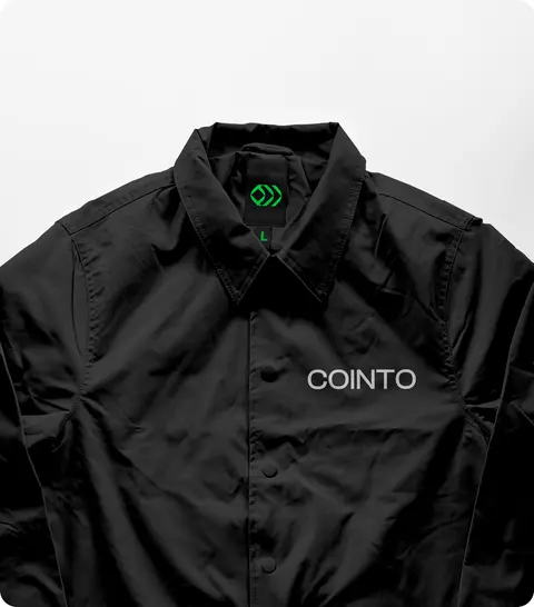 A black work jacket with a small green Cointo mark on the chest.