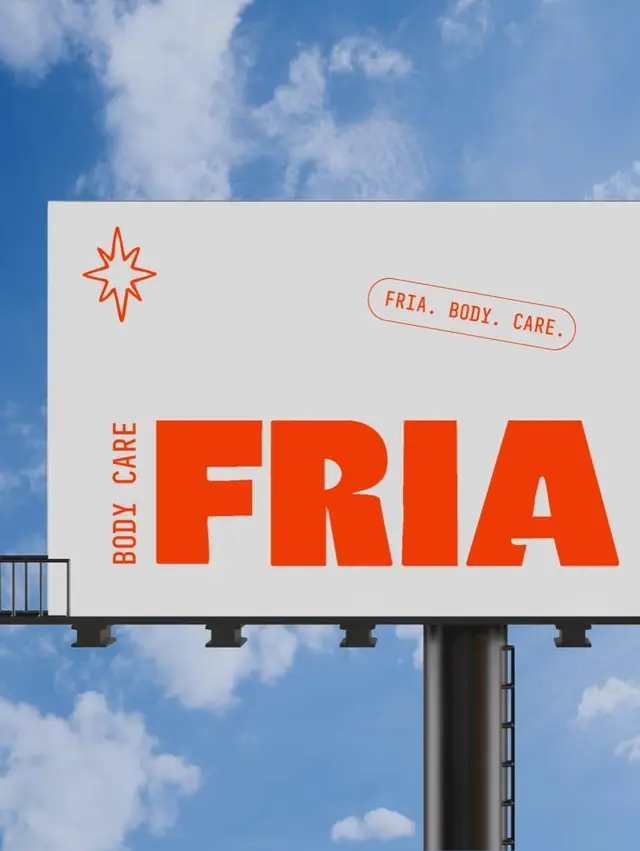 A billboard with a large red wordmark and a star mark against a blue sky.