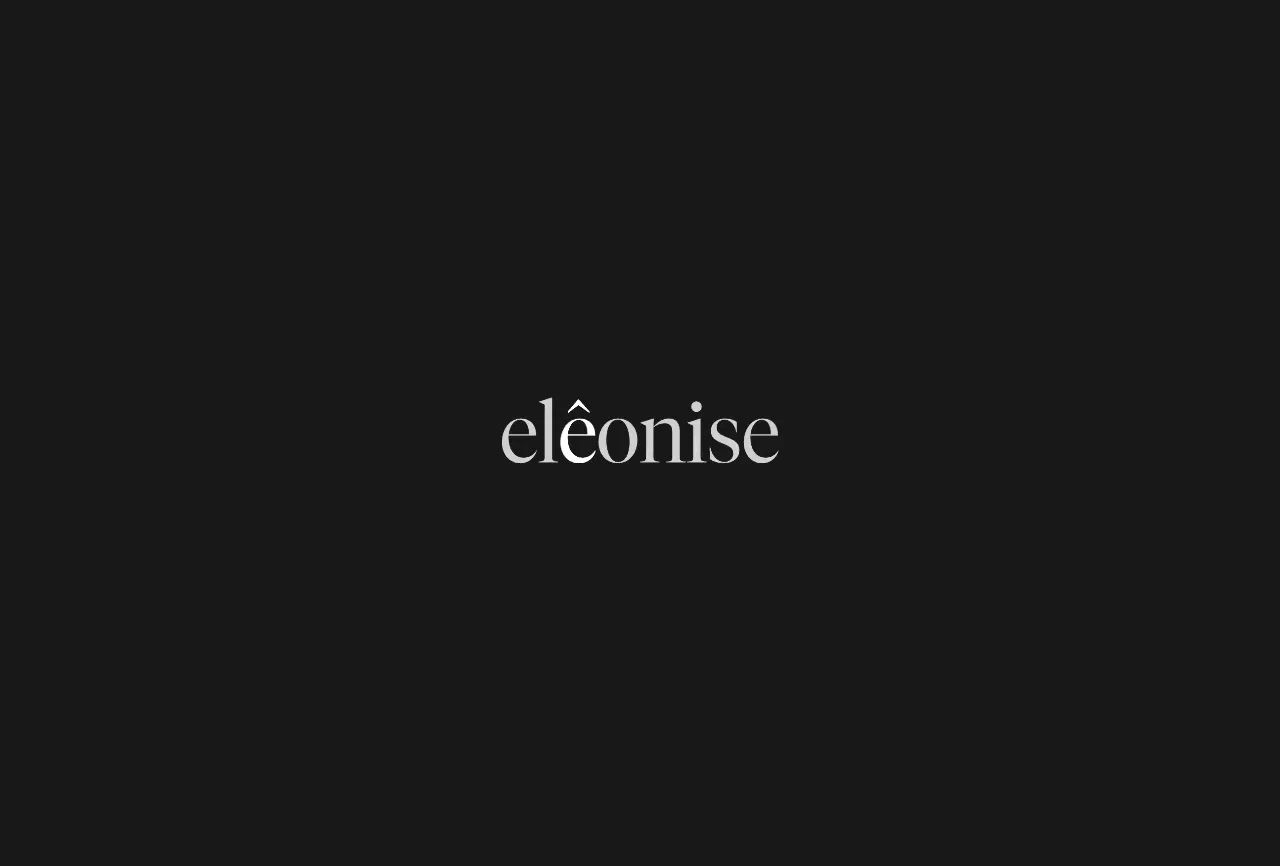 The wordmark fades in on black.