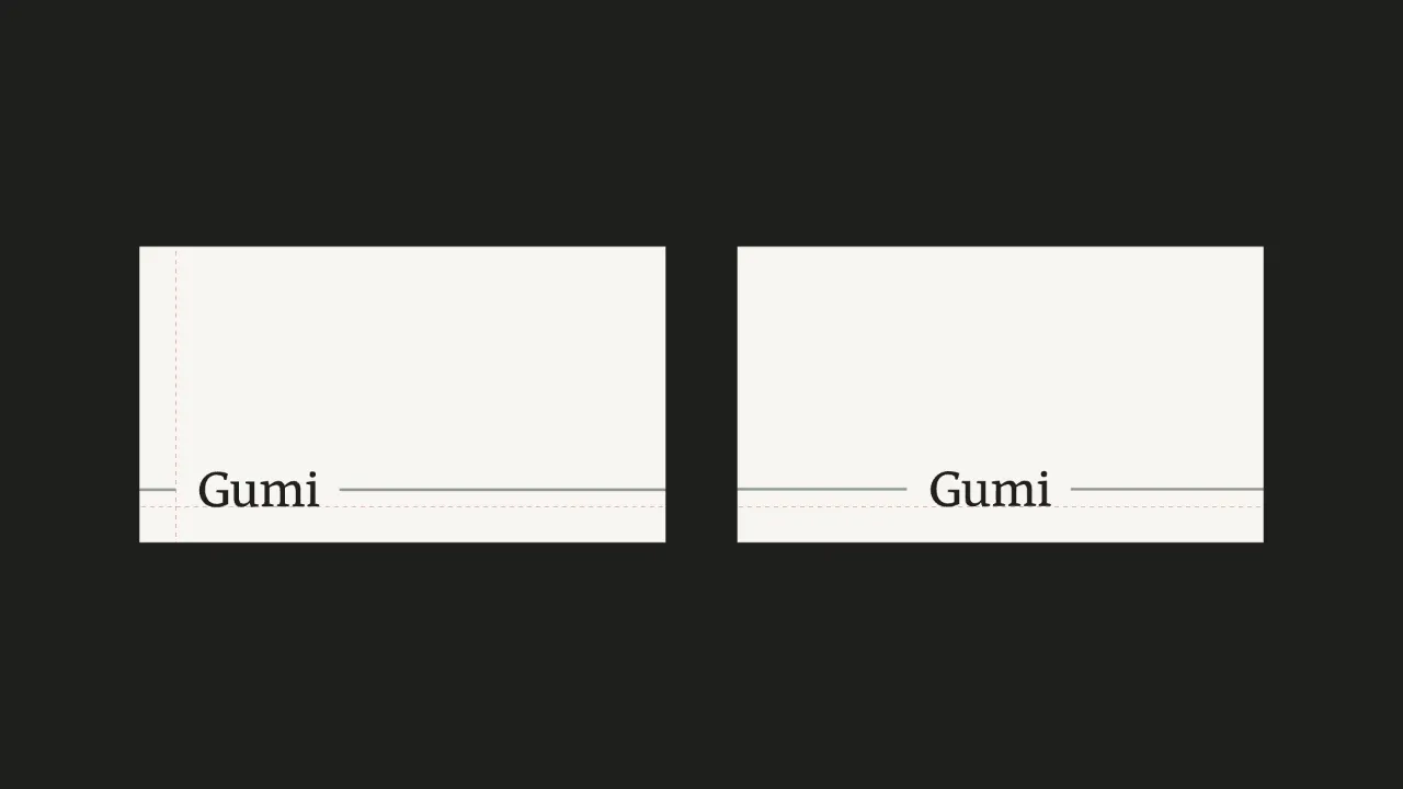 Two cream Gumi business cards on a dark ground, the wordmark and rule drawing in.